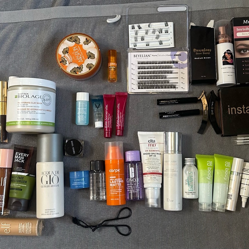 Variety of makeup/hair products/lash